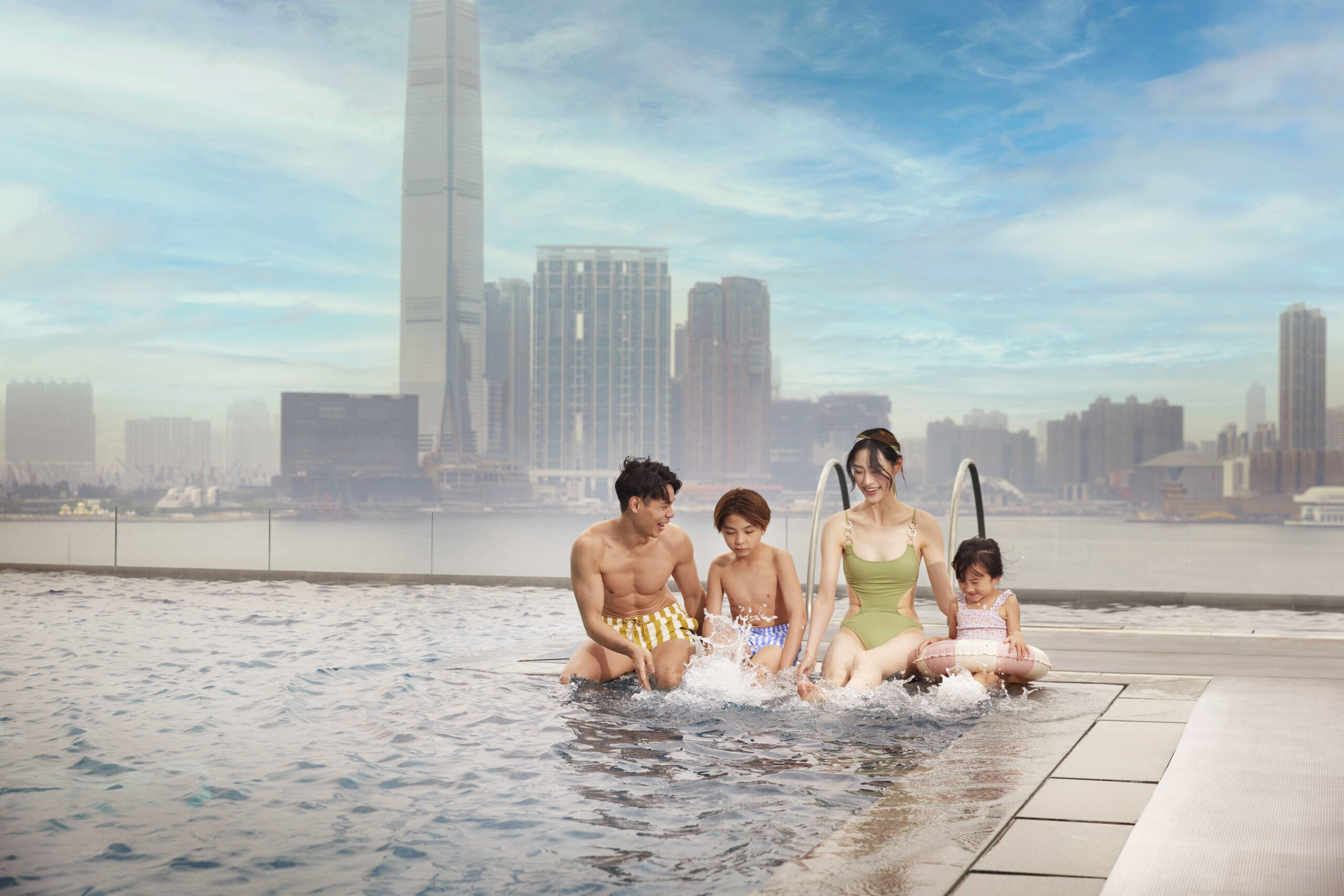 Four Seasons Hotel Hong Kong offers a luxurious summer escape with immersive activities, dining discounts, wellness cuisine, and special family packages, including a "Junior Hospitality Explorer" program for kids.