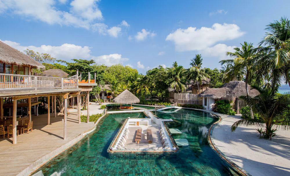 Soneva's "barefoot luxury" resorts in the Maldives and Thailand offer holistic wellness, eco-friendly design, and sustainable practices for a unique, mindful travel experience.