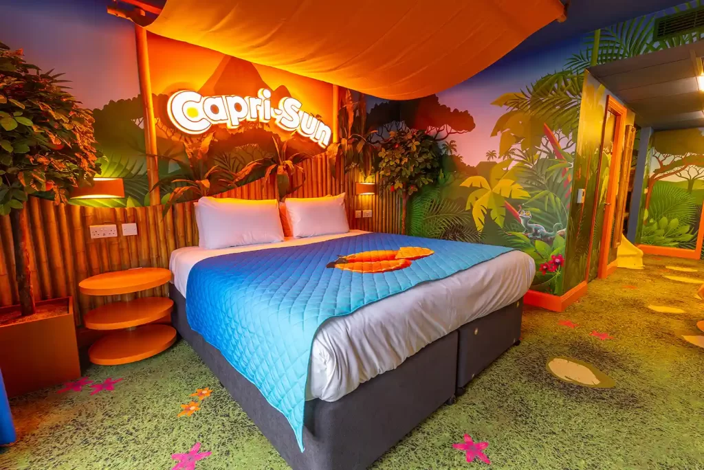 Oreo enthusiasts can now stay in an Oreo-themed hotel room at Chessington World of Adventures Resort, featuring a double stuffed bed, milk-inspired floors, and Oreo-styled decor.