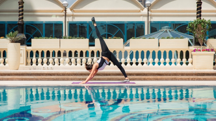 Celebrate Global Wellness Day at Four Seasons Hotel Cairo at The First Residence on June 8, 2024, with wellness activities by the serene outdoor pool, promoting health and balance.