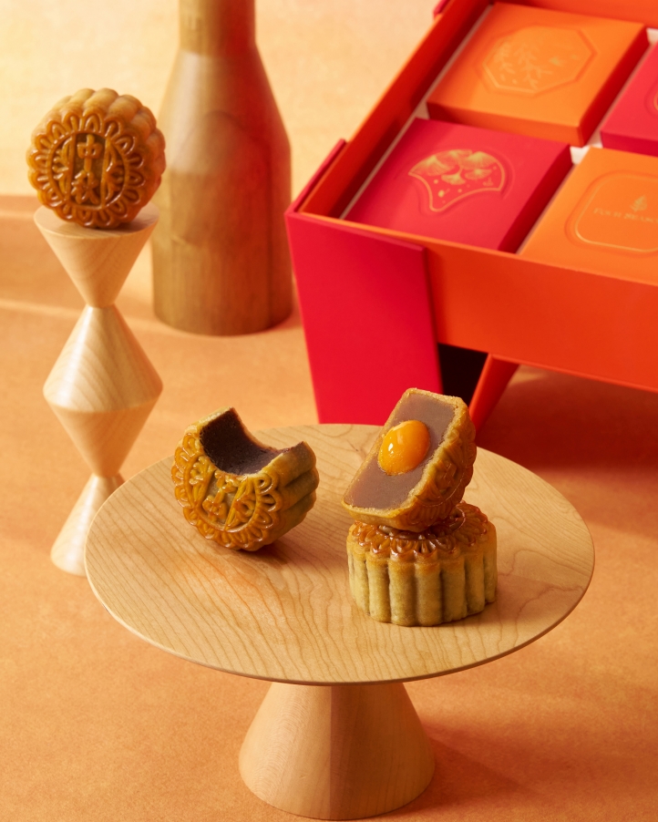 Celebrate Mid-Autumn Festival with luxurious mooncakes from Four Seasons Beijing, featuring traditional and modern flavors in elegantly designed gift boxes, perfect for reunion.