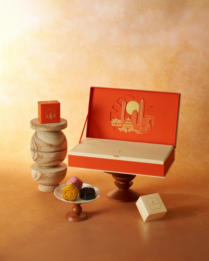 Celebrate Mid-Autumn Festival with luxurious mooncakes from Four Seasons Beijing, featuring traditional and modern flavors in elegantly designed gift boxes, perfect for reunion.