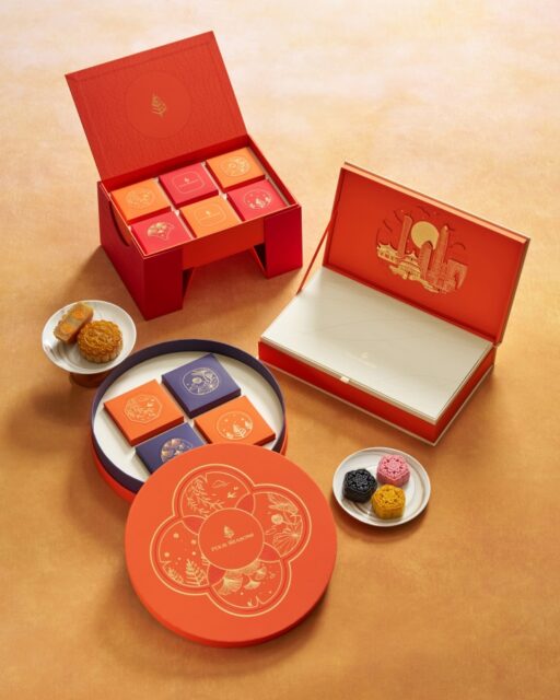 Celebrate Mid-Autumn Festival with luxurious mooncakes from Four Seasons Beijing, featuring traditional and modern flavors in elegantly designed gift boxes, perfect for reunion.