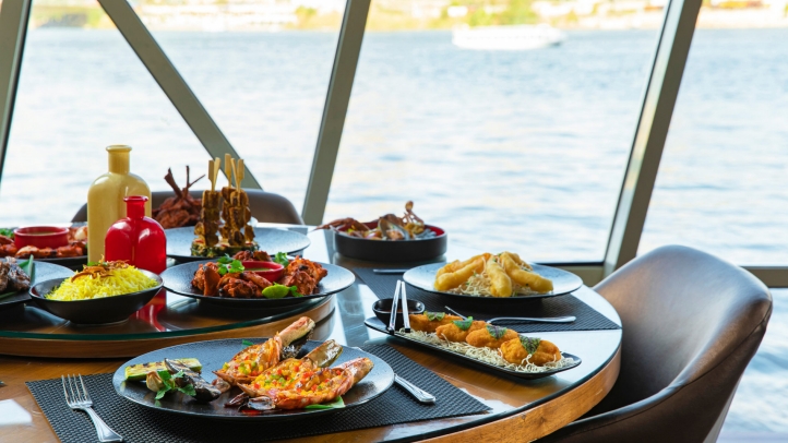 Nairu Restaurant aboard the First Nile Boat in Cairo invites guests to craft custom noodle bowls with fresh ingredients, featuring a variety of noodles, broths, and proteins, all while enjoying stunning views of the Nile.