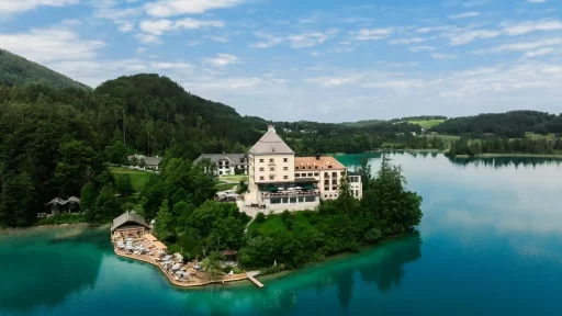 Nestled by Lake Fuschl and the Austrian Alps, Rosewood Schloss Fuschl offers a luxurious retreat. This 15th-century castle reimagines heritage with modern elegance, sustainable practices, and unique cultural experiences.