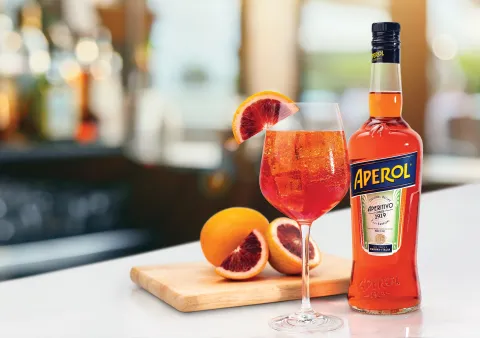 Celebrate summer with Hilton Garden Inn's new Rossa Garden Spritz, a refreshing twist on the classic Aperol spritz with zesty blood orange, available at Garden Grille locations nationwide.