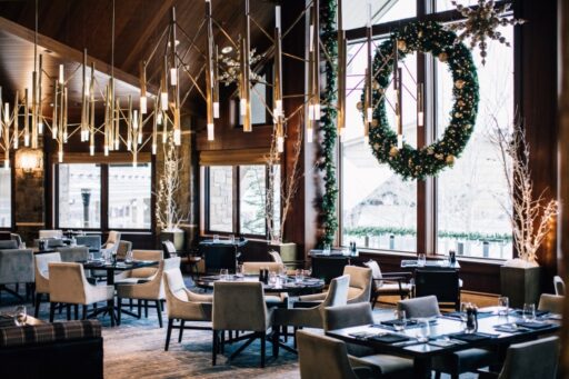 This holiday season, Four Seasons Resort Jackson Hole offers a magical winter escape with premier skiing, festive dining, family activities, and luxurious spa treatments amidst the stunning Jackson Hole landscape.