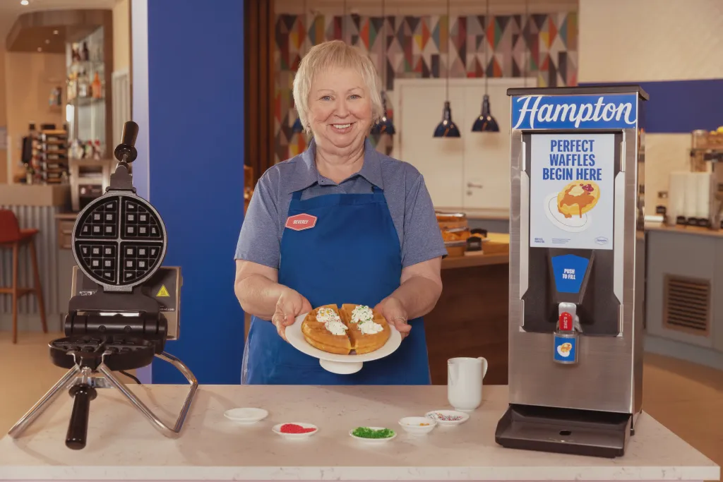 Hampton by Hilton celebrates National Waffle Day with the introduction of Waffle Bosses, standout hosts recognized for their exceptional waffle-making skills and creativity.