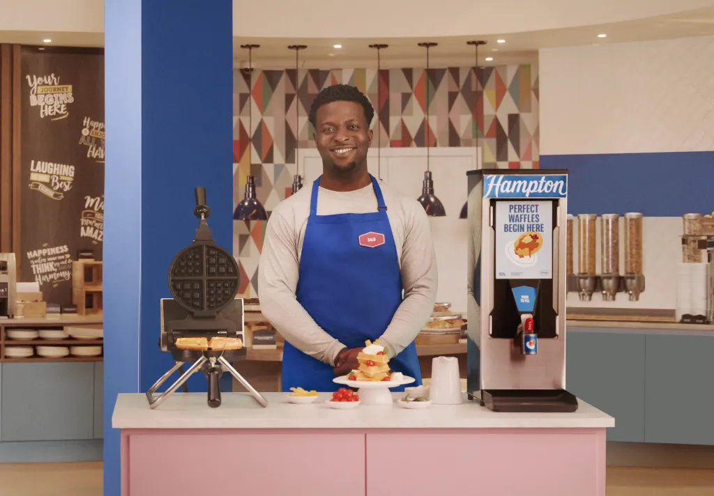 Hampton by Hilton celebrates National Waffle Day with the introduction of Waffle Bosses, standout hosts recognized for their exceptional waffle-making skills and creativity.