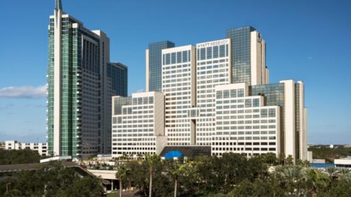 Hyatt sells Hyatt Regency Orlando for $1.07 billion, retaining long-term management and equity, while partners RIDA and Ares plan significant renovations and a new Grand Hyatt.