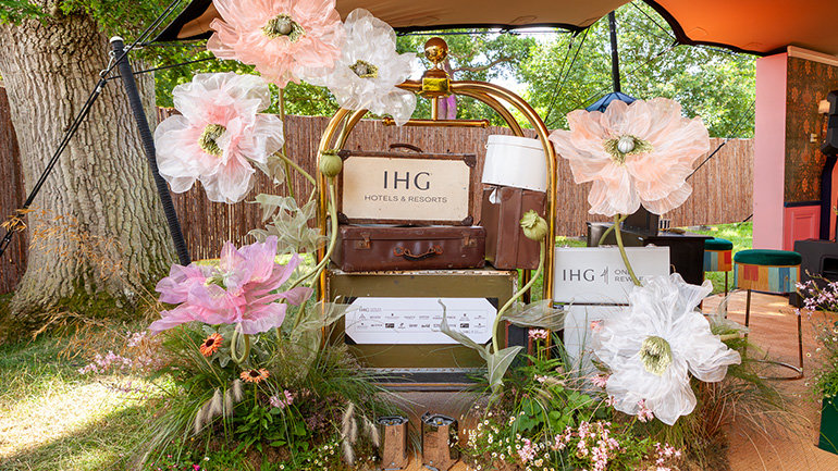 IHG Hotel in the Wild returned to Wilderness Festival, offering whimsical hospitality for festival-goers and celebrities. Inspired by British culture, this pop-up featured luxury and festive twists.