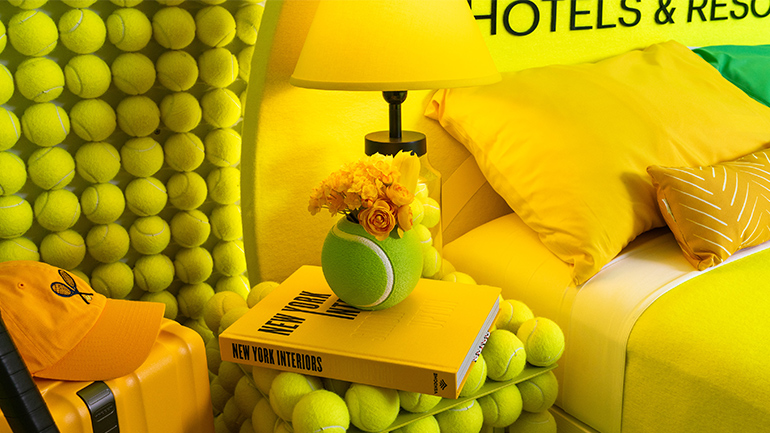 IHG Hotels & Resorts partners with the US Open for the sixth year, unveiling the 'IHG Rally Room,' a tennis-themed suite inspired by the debate on whether tennis balls are green or yellow.