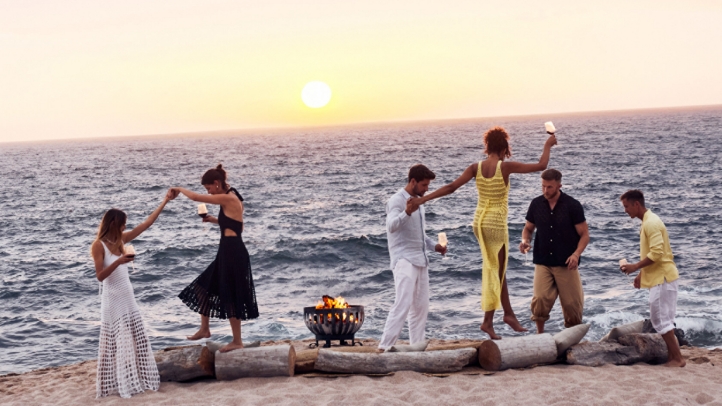 Naviva, A Four Seasons Resort in Punta Mita, Mexico, offers a luxurious holiday escape with communal feasts, spiritual journeys, live music, and serene natural surroundings, perfect for a festive season celebration.