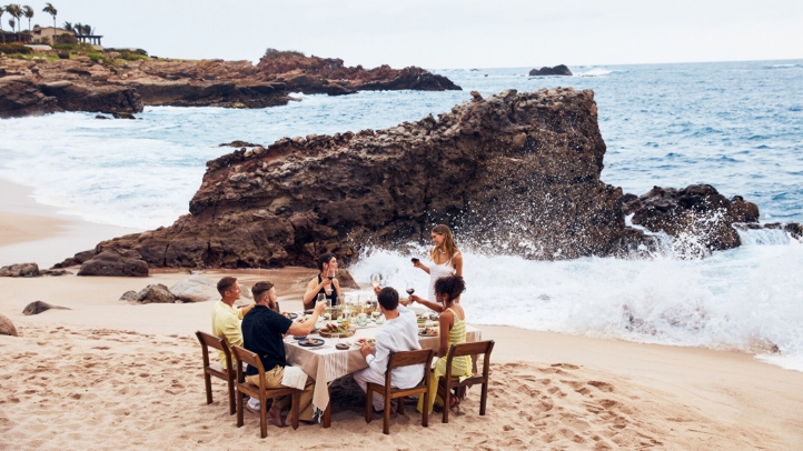 Naviva, A Four Seasons Resort in Punta Mita, Mexico, offers a luxurious holiday escape with communal feasts, spiritual journeys, live music, and serene natural surroundings, perfect for a festive season celebration.