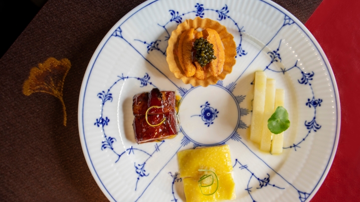 Experience a luxurious culinary journey at Four Seasons Hotel Beijing's Cai Yi Xuan. In collaboration with Royal Copenhagen, savor classic Cantonese dishes on exquisite Blue Fluted Plain porcelain in an intimate, elegant setting.