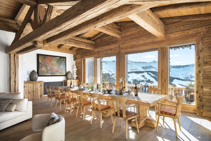 Four Seasons Hotel Megève presents "A Night Above the Clouds," a luxurious mountainside experience inspired by Emily in Paris, offering gourmet dining, romantic carriage rides, and stunning views.