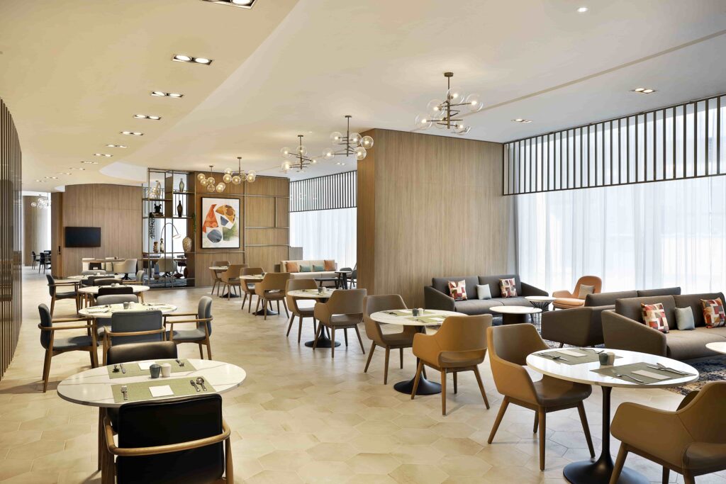 Hilton expands its UAE portfolio with the debut of Embassy Suites by Hilton and the opening of Hilton Garden Inn in Dubai Business Bay, offering luxury accommodations and prime city access.