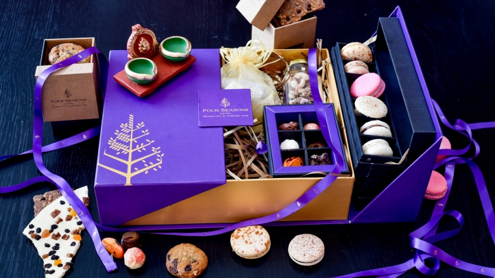 Celebrate Diwali with exclusive gift hampers from Four Seasons Hotel Bengaluru, featuring gourmet delights and locally sourced treats, crafted to reflect the spirit of joy and prosperity.