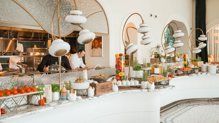 Indulge in the St. Tropez Brunch at Four Seasons Resort at The Pearl-Qatar, featuring Mediterranean flavors, seafood stations, and live entertainment every Saturday from 12 PM to 4 PM.