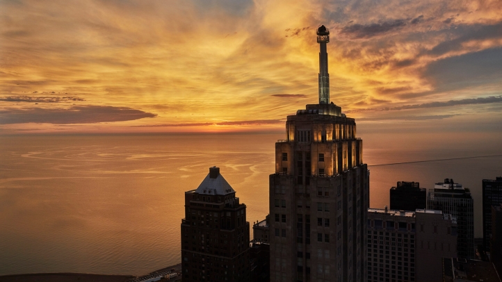 Experience the exclusive Mile High Cocktail Club at Four Seasons Hotel Chicago, a four-month collaboration with Handshake Speakeasy, offering innovative cocktails and stunning skyline views.