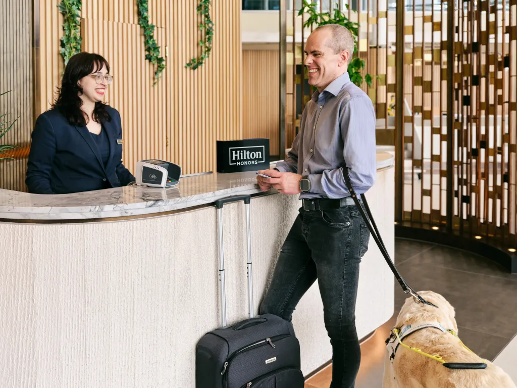 Hilton partners with Be My Eyes to offer AI-powered virtual assistance and personalized support for blind and low-vision guests, enhancing accessibility across its U.S. and Canada hotels.