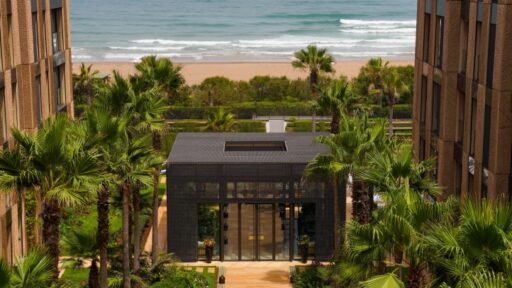 Kyúb at Four Seasons Hotel Casablanca offers a luxurious dining experience with coastal cuisine and Latin American influences, crafted by Chef Aleksandr Gaitsuk in a serene garden setting.