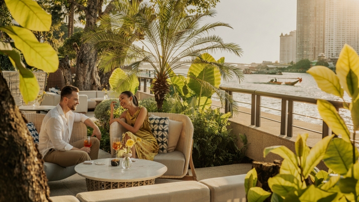 Experience riverside dining at Chao Phraya Terrace, Four Seasons Bangkok, featuring farm-to-table Thai flavors, charcoal-grilled dishes, and sunset views, all crafted with local ingredients.