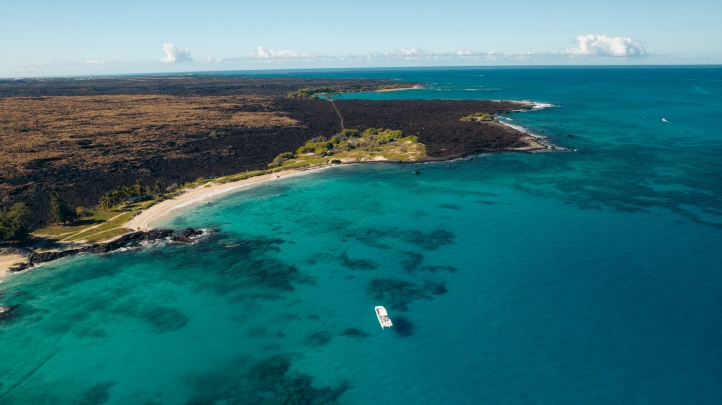 Witness the majestic humpback whale migration at Four Seasons Resort Hualalai. Enjoy private excursions, family activities, and world-class dining during peak whale season.