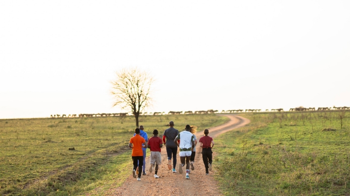 Join Tanzanian marathon runner Alphonce Simbu for guided runs through the Serengeti this festive season, blending adventure, wildlife, and luxury at Four Seasons Safari Lodge.