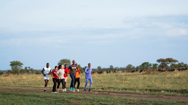 Join Tanzanian marathon runner Alphonce Simbu for guided runs through the Serengeti this festive season, blending adventure, wildlife, and luxury at Four Seasons Safari Lodge.