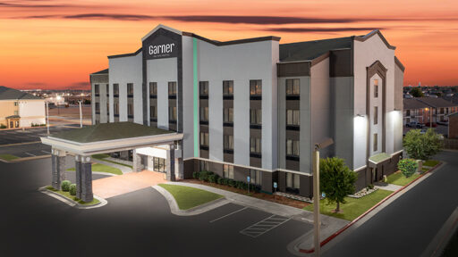 Garner Hotels celebrates its first year with over 90 properties in the pipeline, blending affordable stays, essential amenities, and global expansion in the midscale hospitality market.