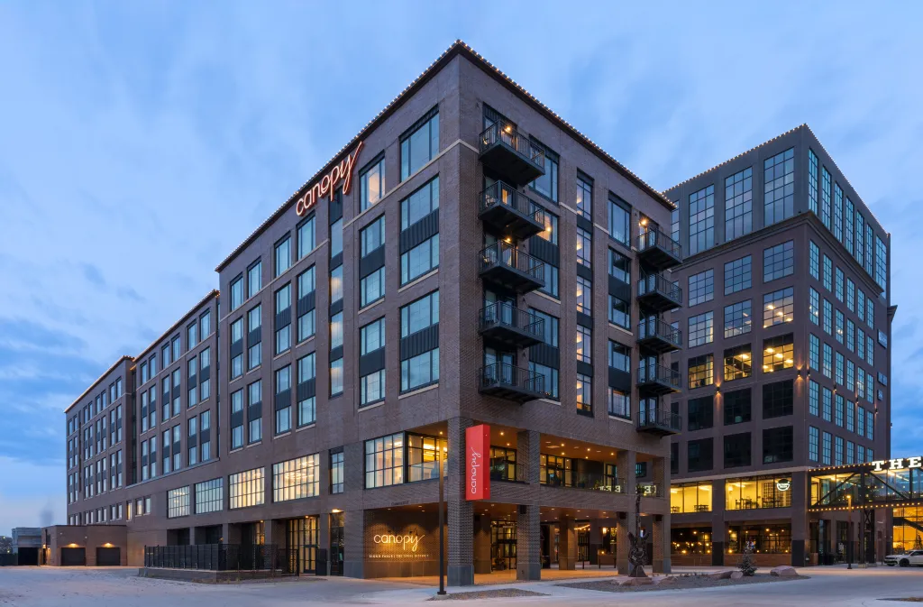 Canopy by Hilton debuts in South Dakota with a boutique hotel in Sioux Falls’ Steel District, offering locally inspired design, Italian dining, and scenic riverfront views.