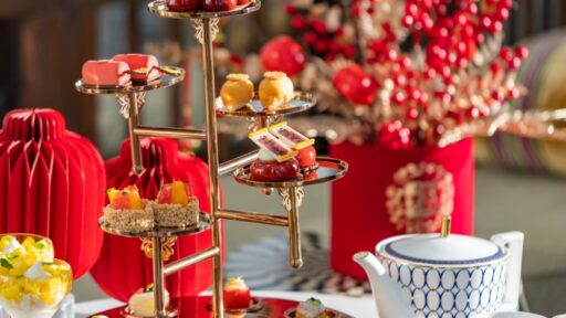 Celebrate Chinese New Year with the "Flavours of Reunion" afternoon tea at Four Seasons Dalian, featuring festive treats, premium teas, and stunning views from the 41st floor.