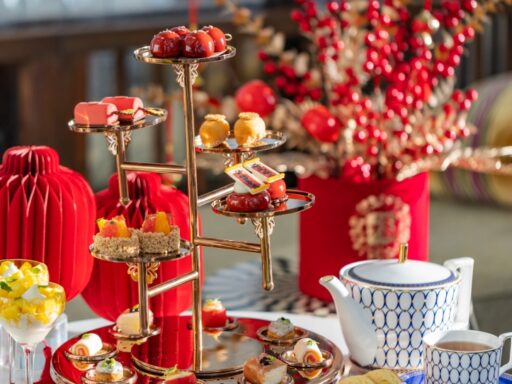 Celebrate Chinese New Year with the "Flavours of Reunion" afternoon tea at Four Seasons Dalian, featuring festive treats, premium teas, and stunning views from the 41st floor.