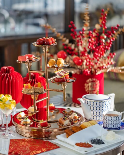 Celebrate Chinese New Year with the "Flavours of Reunion" afternoon tea at Four Seasons Dalian, featuring festive treats, premium teas, and stunning views from the 41st floor.