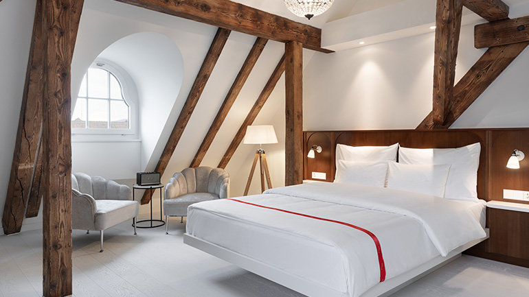 IHG Hotels & Resorts acquires Ruby, a premium urban lifestyle brand, expanding its portfolio to 20 brands with plans for global growth in key cities and new markets.