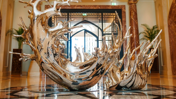 Four Seasons Hotel Doha marks 20 years of luxury with Michelin-starred chef events, a gala dinner, and a new sculpture, celebrating its legacy of excellence and innovation.