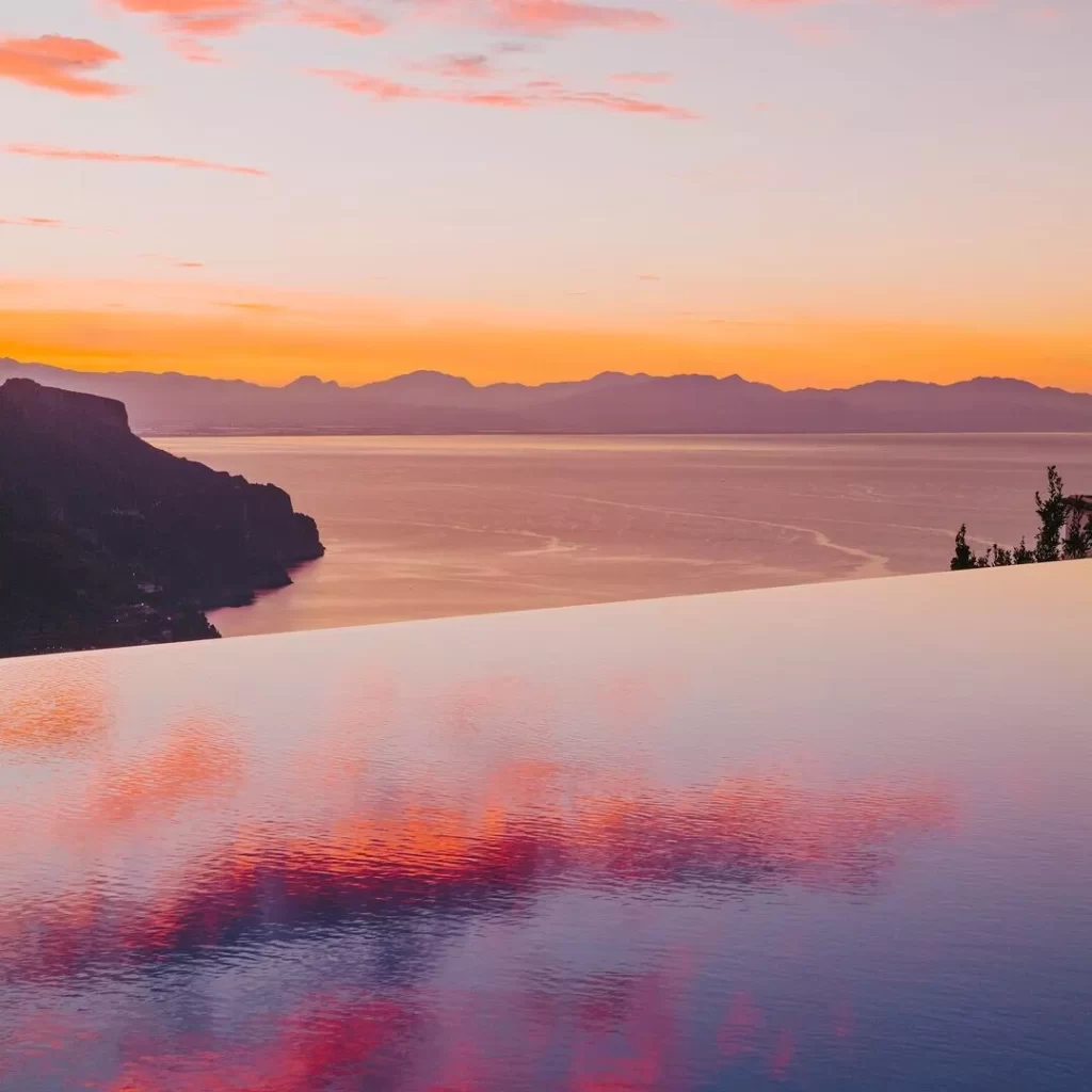 La Piscina, A Caruso Pool Club, debuts on the Amalfi Coast with luxe cabanas, curated wellness, Mediterranean cuisine, and stunning views at Belmond Hotel Caruso in Ravello.