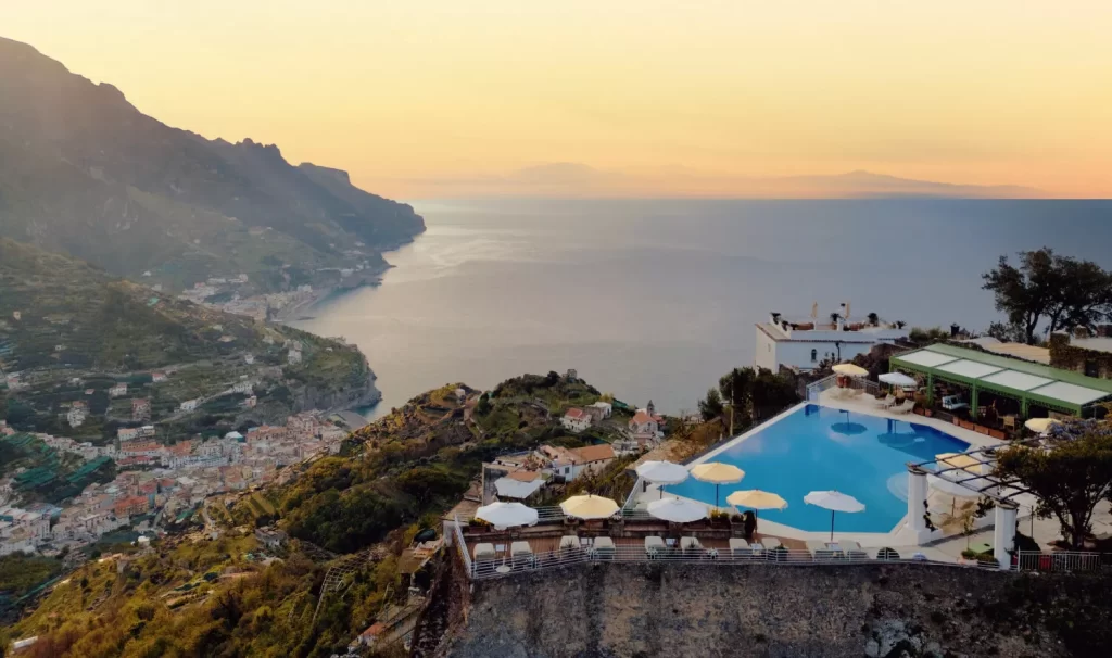La Piscina, A Caruso Pool Club, debuts on the Amalfi Coast with luxe cabanas, curated wellness, Mediterranean cuisine, and stunning views at Belmond Hotel Caruso in Ravello.