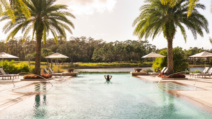 Enjoy a luxury family getaway at Four Seasons Resort Orlando with a fourth night free, resort credits, kid-friendly fun, spa perks, and exclusive Disney park benefits.