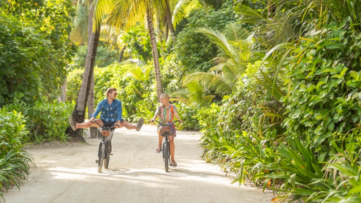 Four Seasons Maldives offers purpose-driven family escapes with marine programs, surfing, private villas, and activities designed to inspire all ages in a stunning island setting.