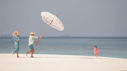 Four Seasons Maldives offers purpose-driven family escapes with marine programs, surfing, private villas, and activities designed to inspire all ages in a stunning island setting.