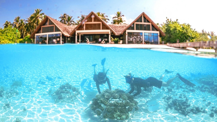 Four Seasons Maldives offers purpose-driven family escapes with marine programs, surfing, private villas, and activities designed to inspire all ages in a stunning island setting.