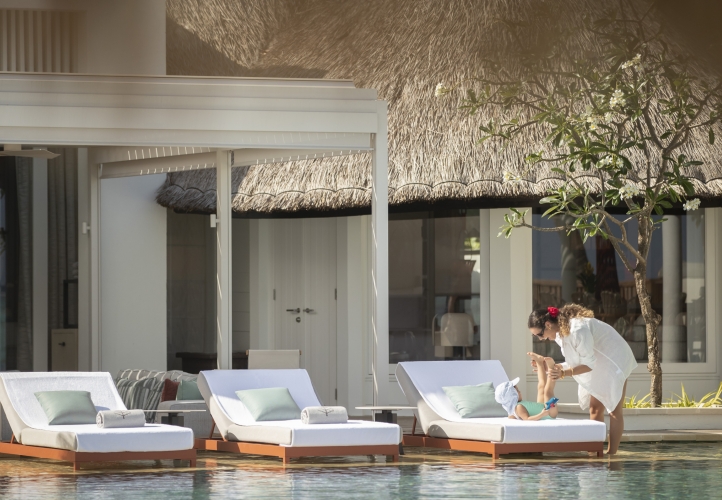Four Seasons Maldives offers purpose-driven family escapes with marine programs, surfing, private villas, and activities designed to inspire all ages in a stunning island setting.