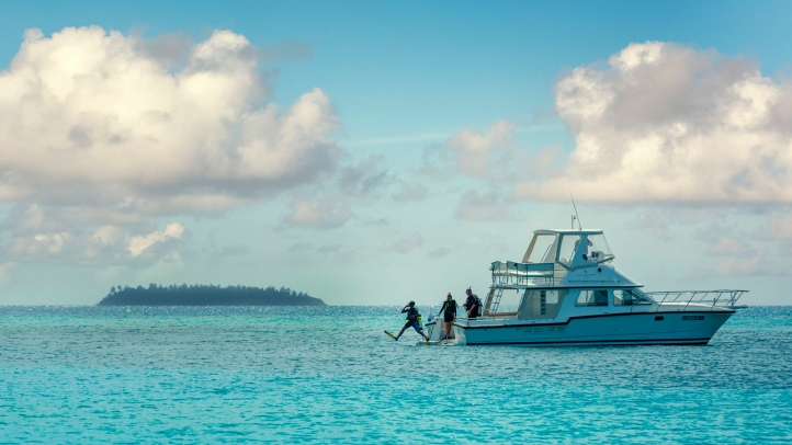Four Seasons Maldives offers purpose-driven family escapes with marine programs, surfing, private villas, and activities designed to inspire all ages in a stunning island setting.