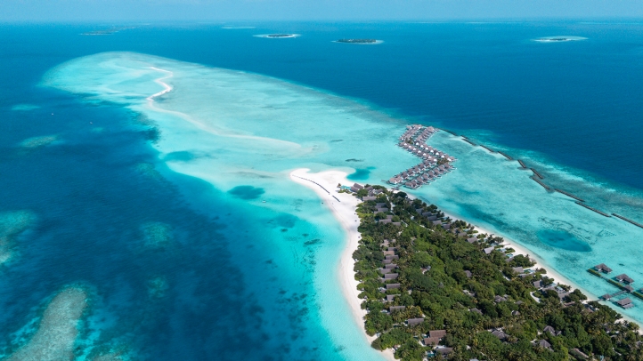 Four Seasons Maldives offers purpose-driven family escapes with marine programs, surfing, private villas, and activities designed to inspire all ages in a stunning island setting.
