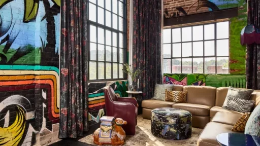 The Radical Hotel in Asheville joins Hilton’s Tapestry Collection, offering artful stays, bold design, local flair, and Hilton Honors perks in the vibrant River Arts District.